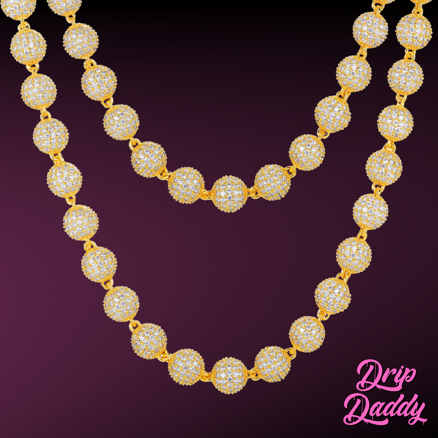 Close-up of Drip Daddy’s Ice Orbit 5mm to 10mm moissanite chain in yellow gold plated finish, highlighting the larger fully iced round links, displayed against a gradient dark-to-light purple background, with the Drip Daddy logo in pink at the bottom right corner.