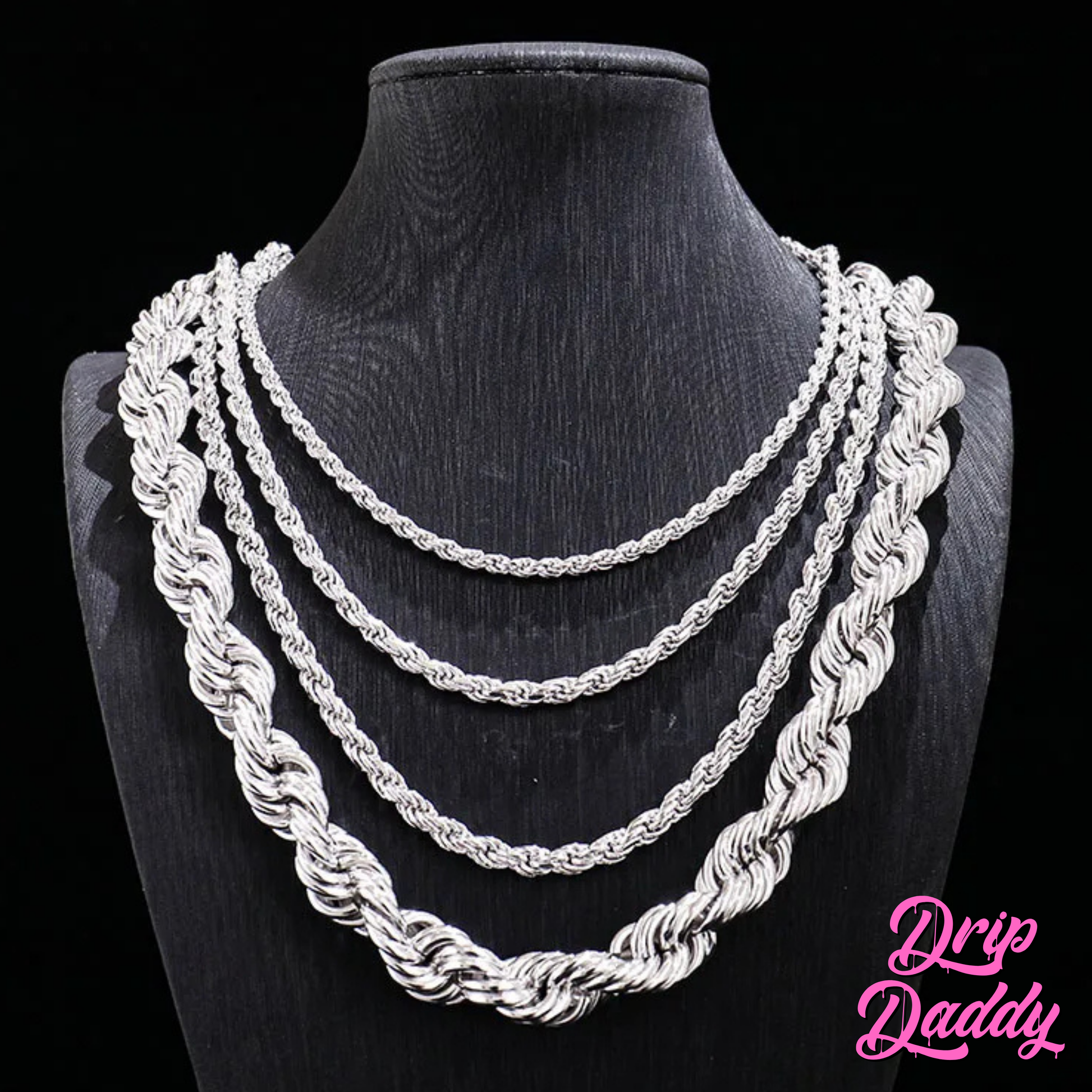 A black necklace bust showcases four Drip Daddy Classic Rope Chains (3mm–12mm, White Gold Plated) layered by thickness. The pink Drip Daddy logo is in the bottom right corner.