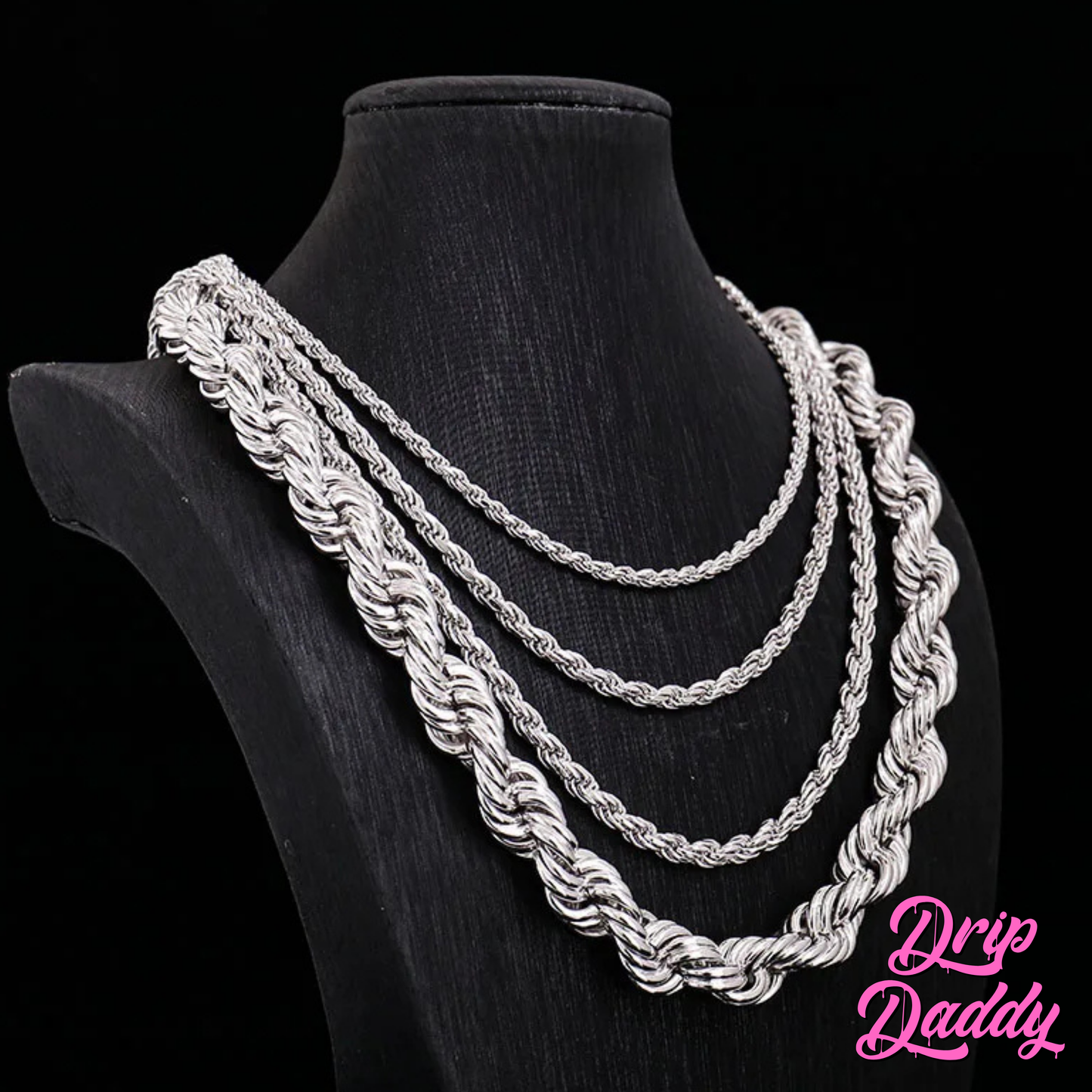 Four Classic Rope Chains (3mm-12mm, White Gold Plated) by Drip Daddy are shown on a black bust against a black background. Drip Daddy appears in pink script at the lower right corner.