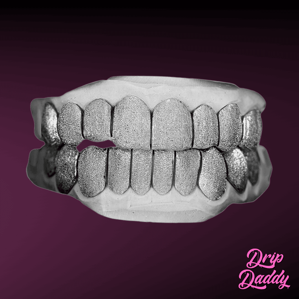 Full top and bottom grillz with diamond dust finish in polished 925 sterling silver, shown on a dental mold, by Drip Daddy.