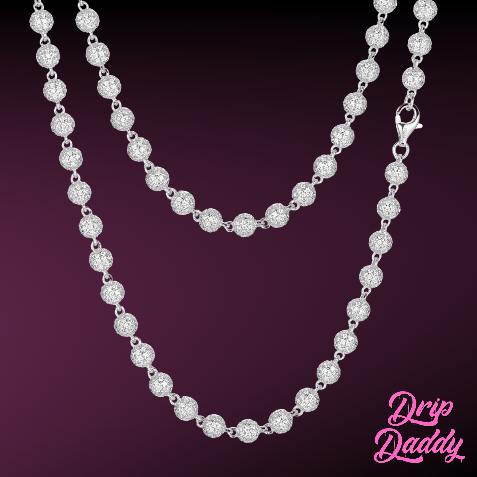 Close-up of Drip Daddy’s Ice Orbit 5mm to 10mm moissanite chain in white gold plated finish, shown in full length against a gradient dark-to-light purple background, with the Drip Daddy logo in pink at the bottom right corner.