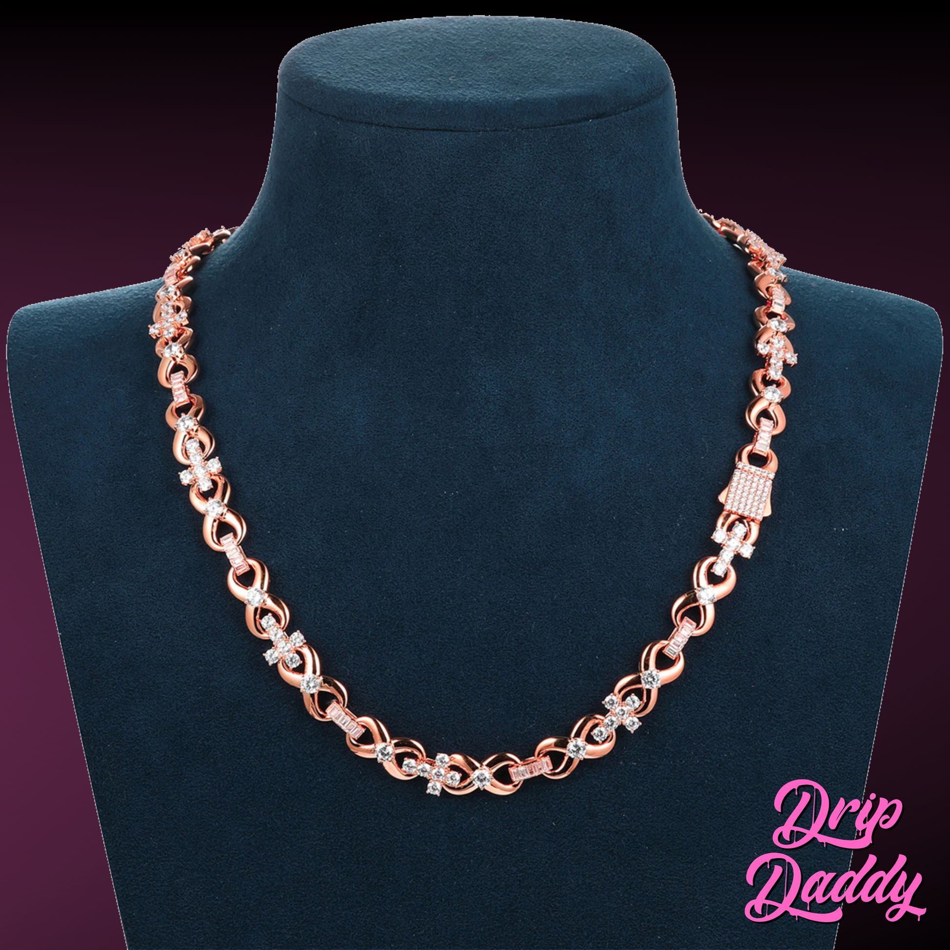The Infinity Cross Plain – 10mm Mixed Link Chain in rose gold by Drip Daddy, displayed on a blue mannequin bust with diamond-studded details. The Drip Daddy logo is visible in pink at the bottom right.