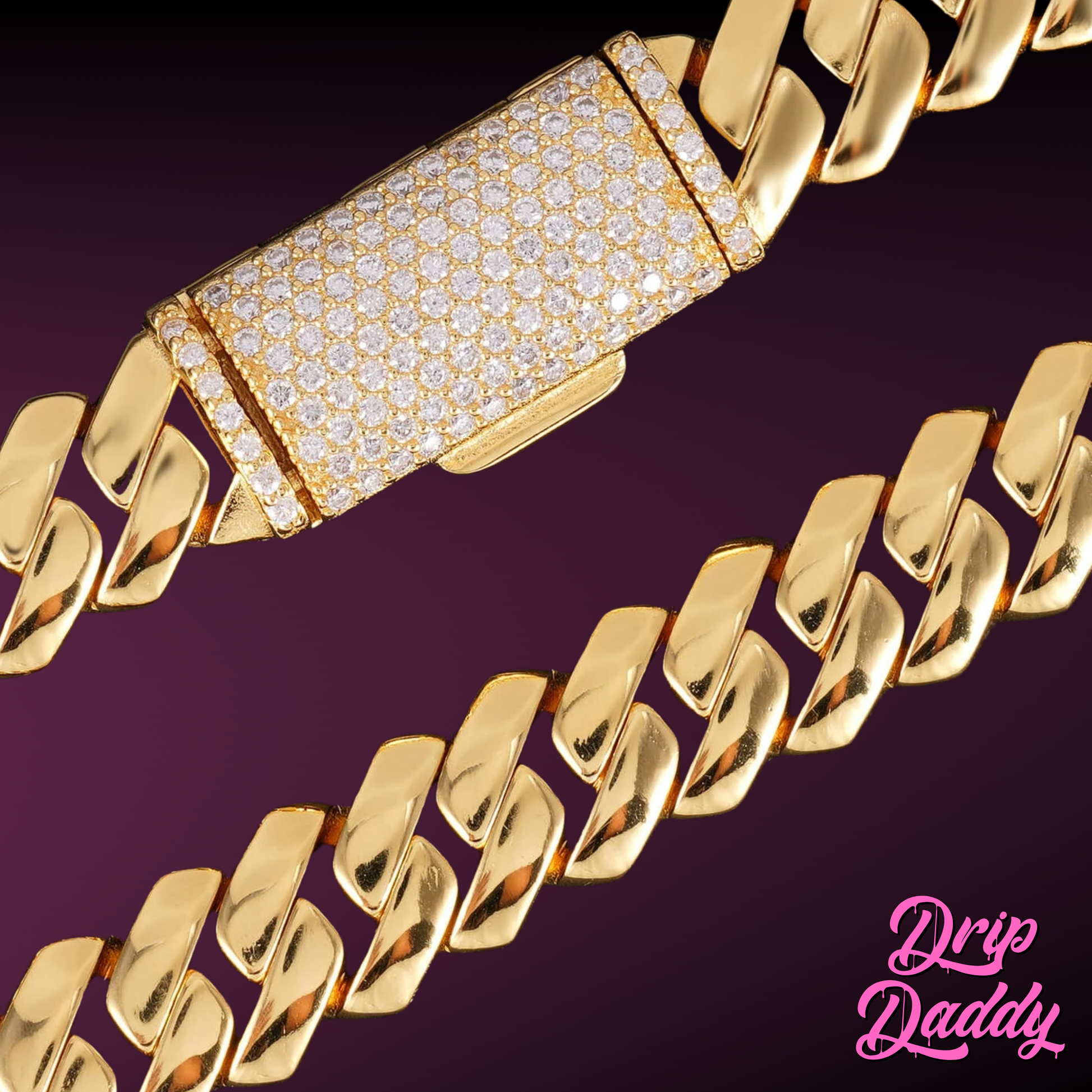Detailed close-up of Drip Daddy’s The Hustler Cuban Link Chain in yellow gold plated finish with a rectangular iced clasp encrusted with stones, photographed against a burgundy gradient background, with the pink Drip Daddy logo visible in the bottom right corner.