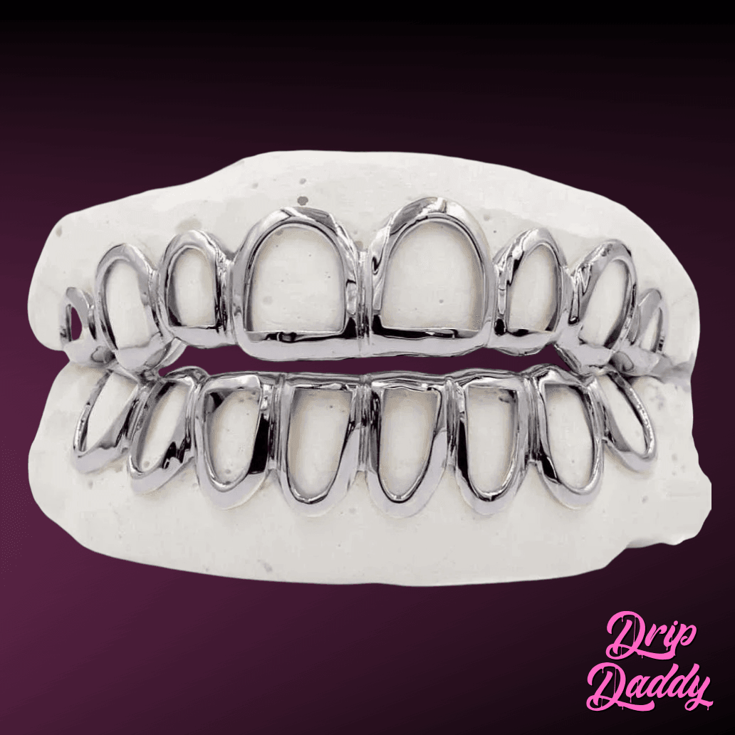 Custom Open Face Window Grillz in rhodium-plated 925 sterling silver, full upper and lower set on a dental mold, shown on a purple gradient with the Drip Daddy logo.