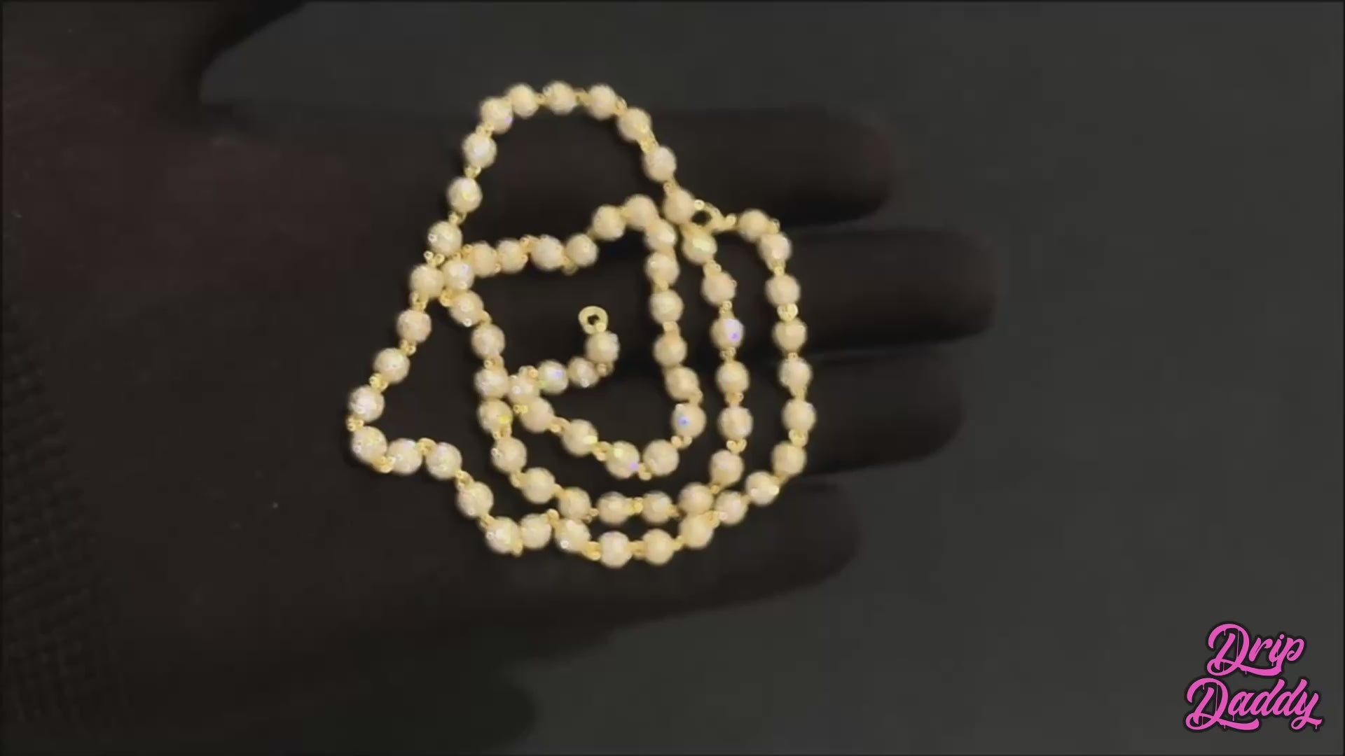 Video showcasing the Ice Orbit chain, a 5mm–10mm moissanite Cuban link with icy brilliance. Features white gold plating, hand-set stones, and bold streetwear luxury styling. Close-up angles highlight sparkle and craftsmanship.