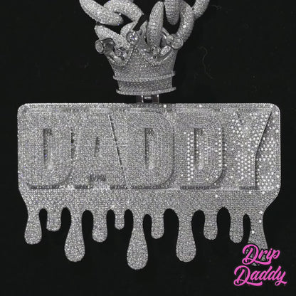 Detailed video of a custom Daddy pendant crafted in sterling silver with white gold plating and iced with moissanite stones, highlighting brilliance and craftsmanship.