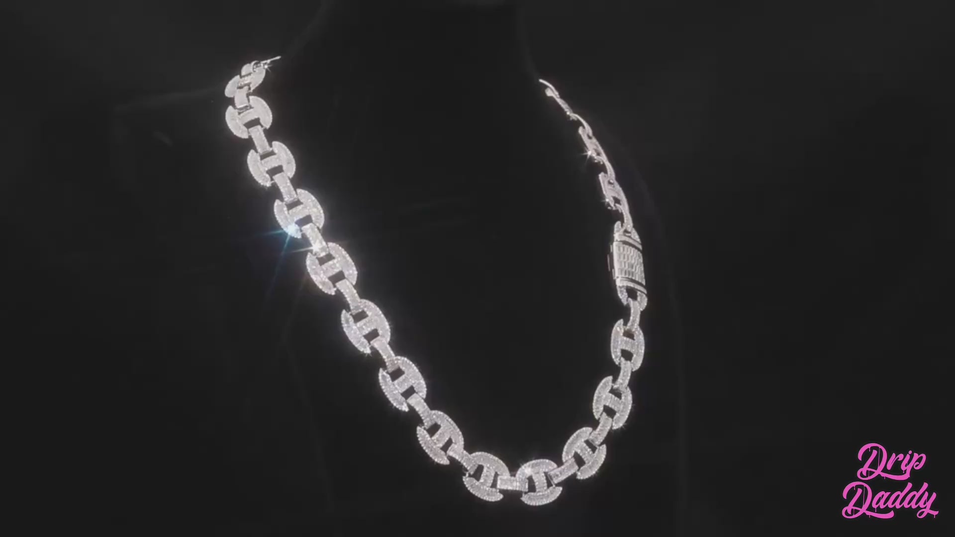 A rotating showcase of the Drip Daddy G-Link – 16mm Baguette Moissanite Chain in both white gold and yellow gold. The video highlights the sparkle of the baguette and round moissanite stones from multiple angles.